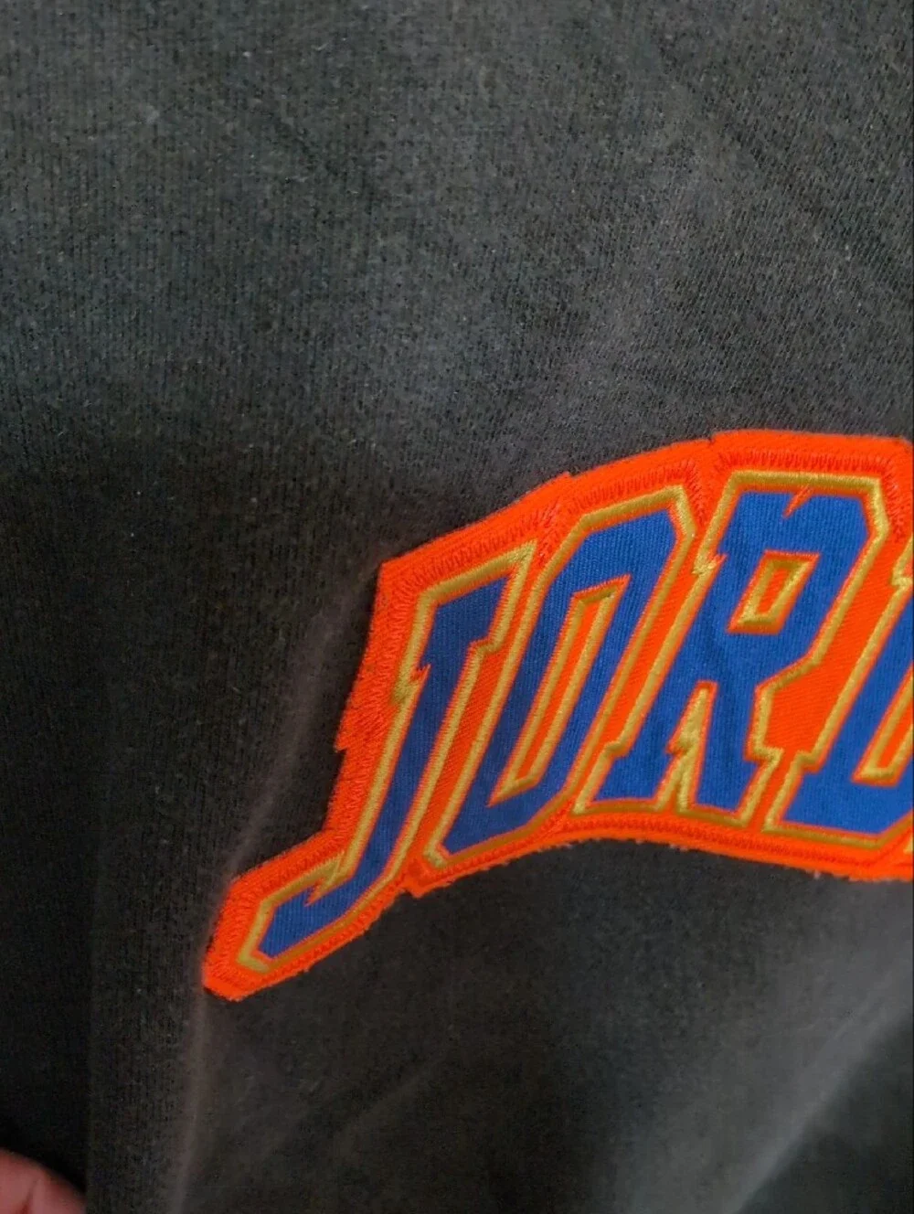 Jordan Black Hooded Sweatshirt with Orange and Blue Logo